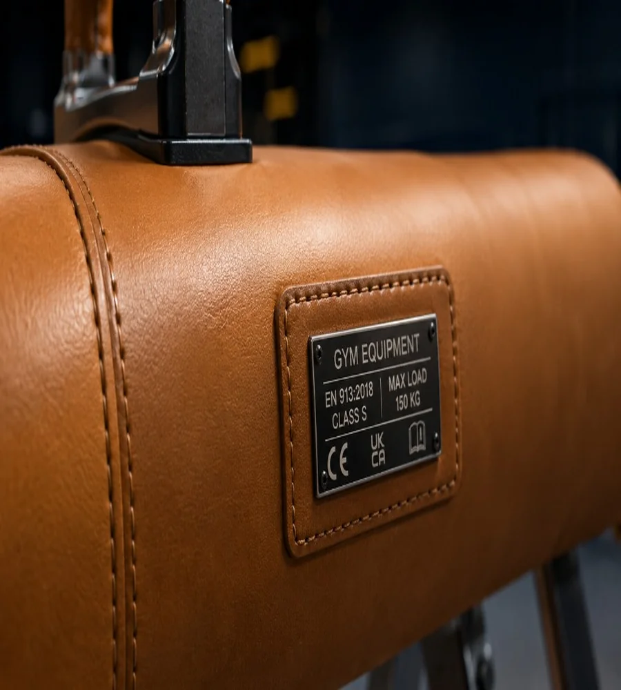 Custom logo embossed on blue leather upholstery